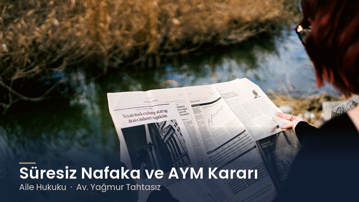 Nehir kenarında gazete okuyan kadın – Süresiz Nafaka Kaldırıldı mı? Anayasa Mahkemesi Kararı